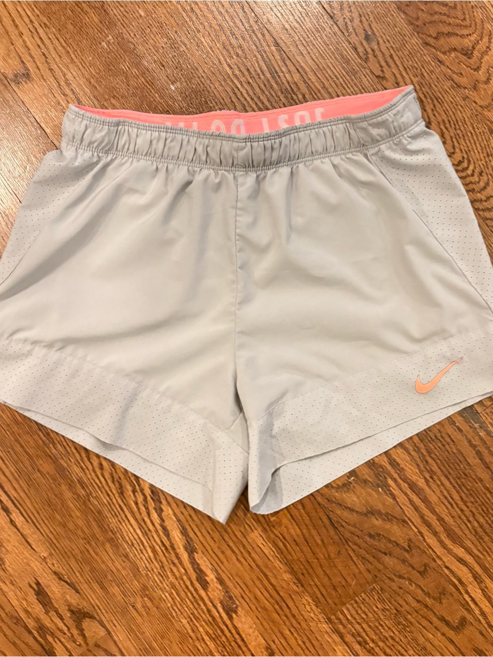 Nike Dri Fit Women's Light Gray Athletic Shorts with Pink Trim